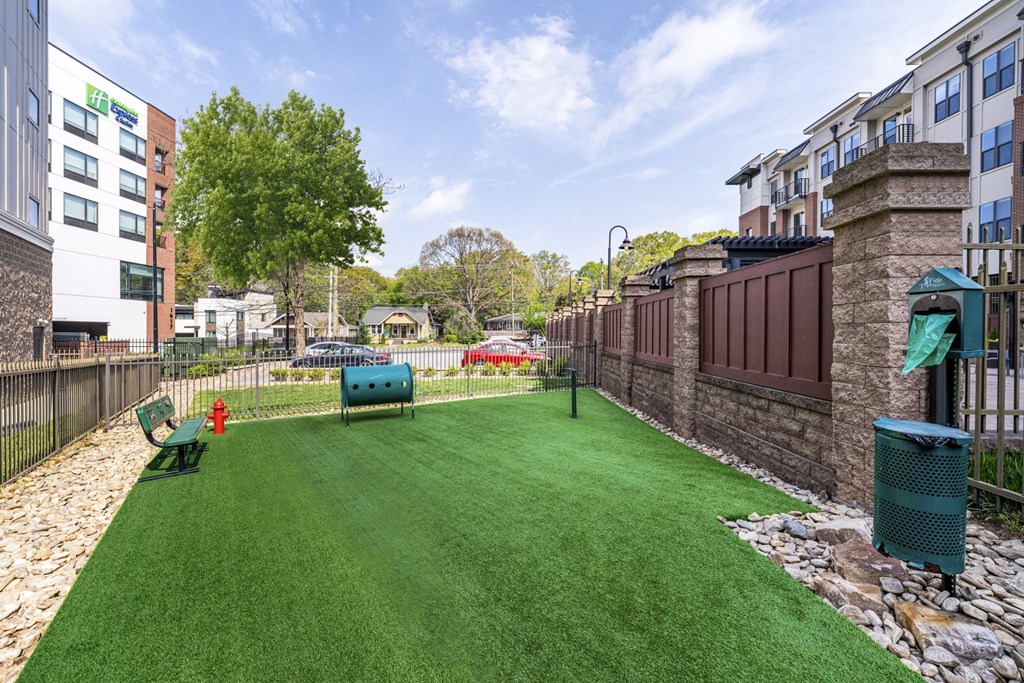 Pet park with benches and agility course  at Park and Kingston, Charlotte, NC, 28203