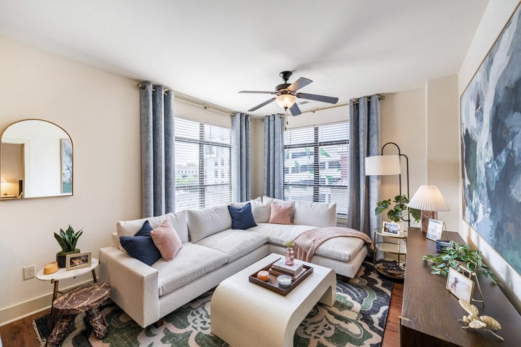 a living room with a couch and a ceiling fan at Park and Kingston, Charlotte, 28203