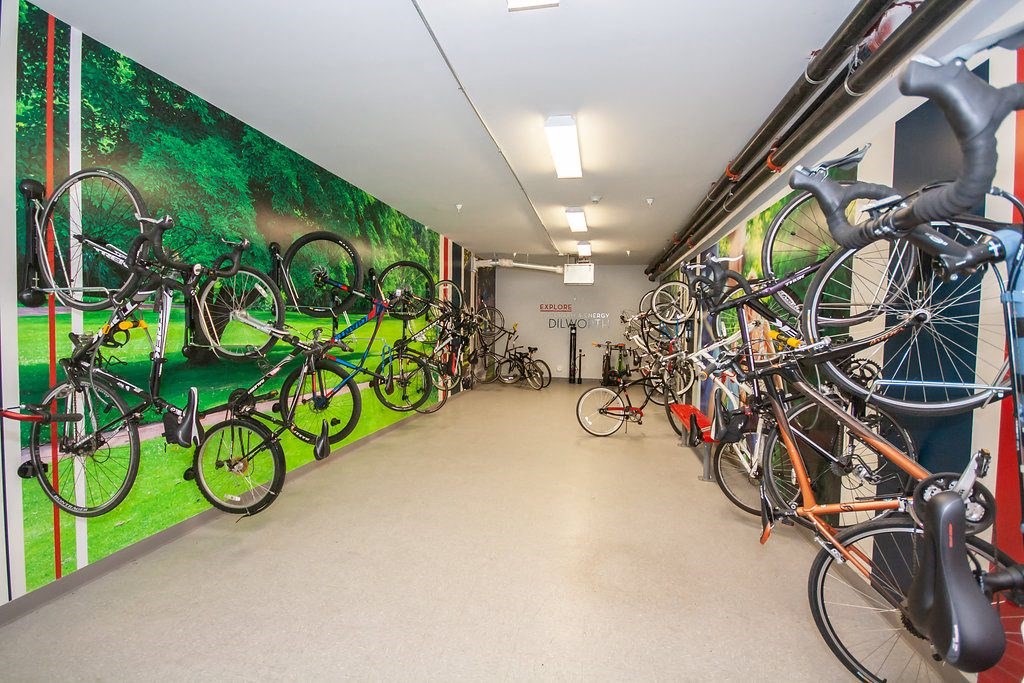 Bike shop with bicycles hanging on the wall at 1010 Dilworth Apartments, Charlotte, 28204