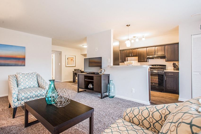 Open living room kitchen and dining area Open living room kitchen and dining area at Brook View Apartments, Baltimore, Maryland