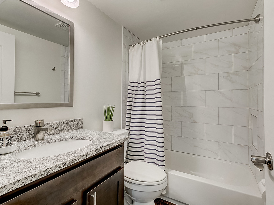 Updated bathroom at Kenilworth at Perring Park Apartments, Maryland, 21234