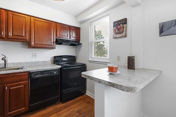 Kitchen with Window Kitchen with Window at Donnybrook Apartments, Towson - Photo Gallery 3