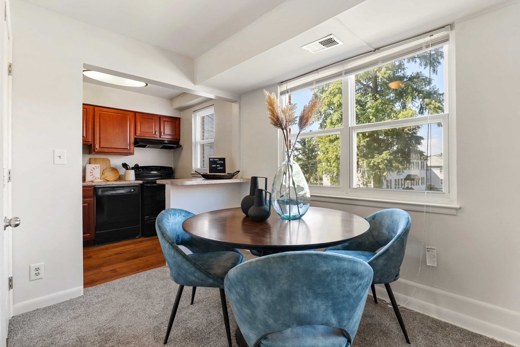 Dining room with kitchen bar at Donnybrook Apartments, Towson, MD