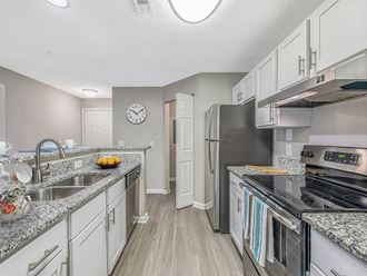 Kitchen with Island at The Village Apartments, North Carolina, 27615