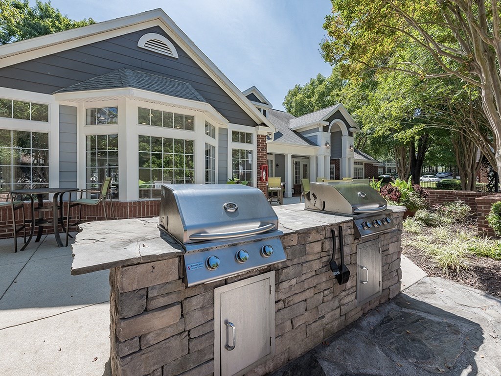 Outdoor Grilling Area at The Village Apartments, Raleigh, NC, 27615