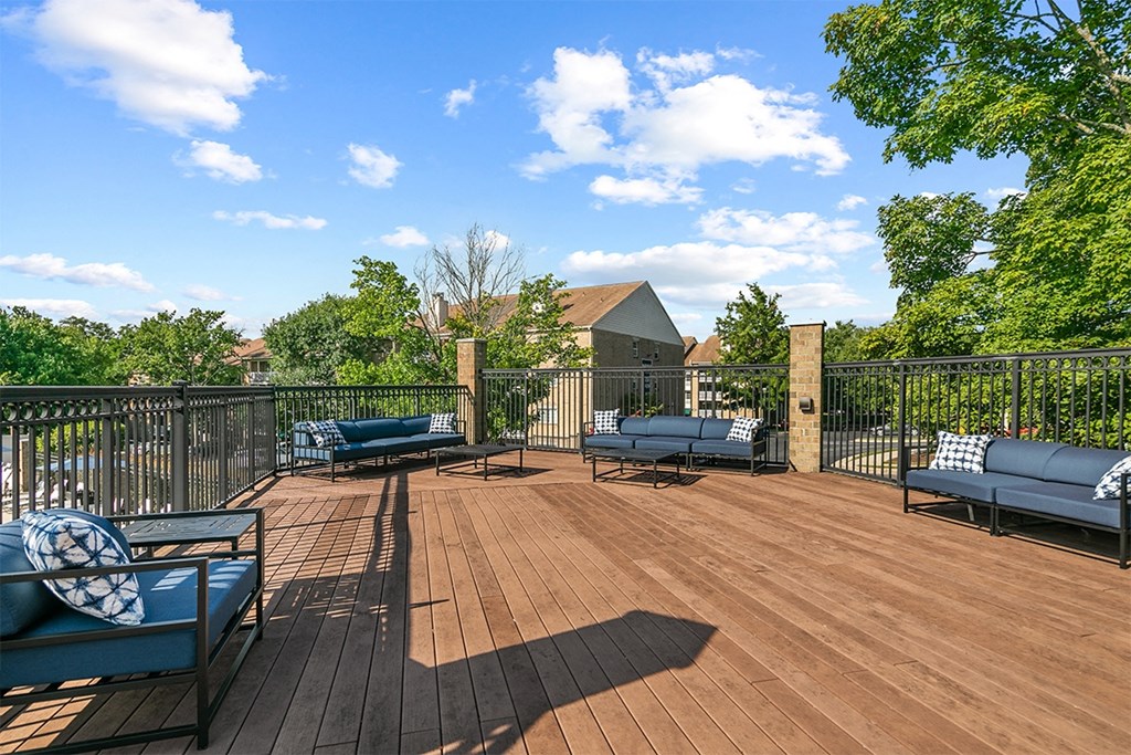 spacious deck with furniture and privacy fence spacious deck with furniture and privacy fence at McDonogh Township Apartments, Owings Mills