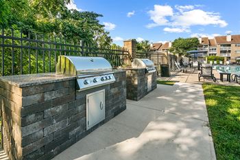 outdoor kitchen with two grilling stations at McDonogh Township Apartments, Owings Mills, MD