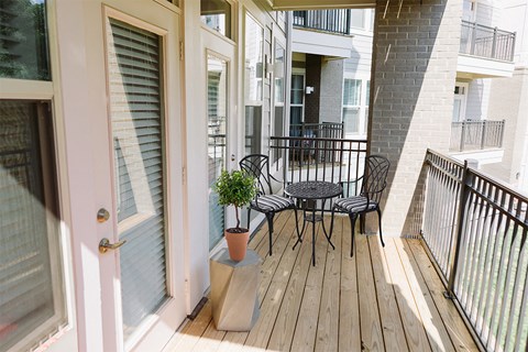 Patio with table and chair set at Sycamore at Tyvola, Charlotte, 28217