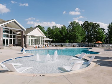 Swimming pool with tanning ledges at Sycamore at Tyvola, Charlotte