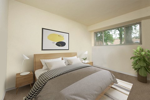 a bedroom with a bed and a window