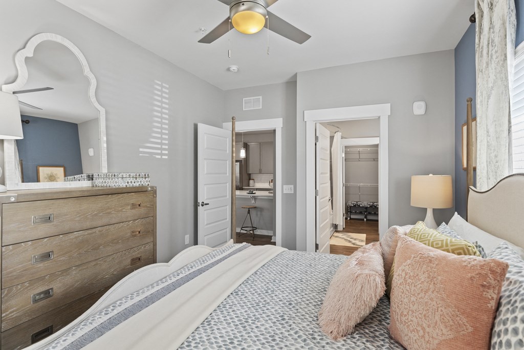 Bedroom with bed and thowpillows at Central Island Square, Daniel Island, SC, 29492