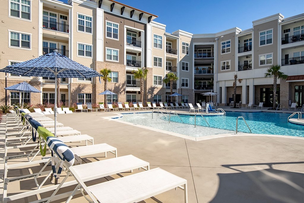 Sparkling pool with sun loungers  at Central Island Square, South Carolina