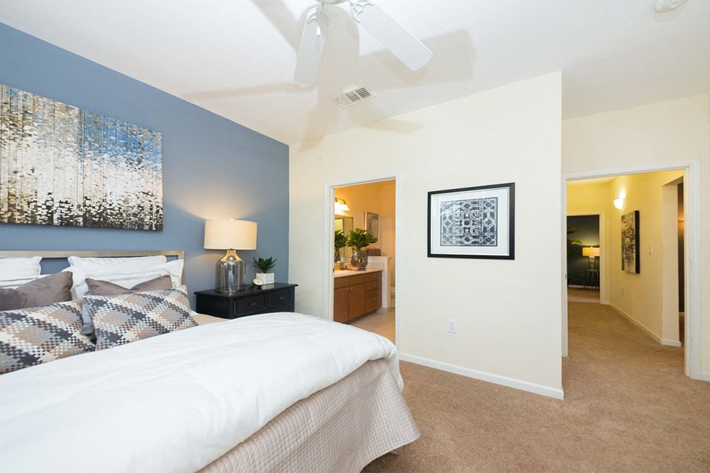 bedroom with blue accent wall at Fortress Grove, Tennessee