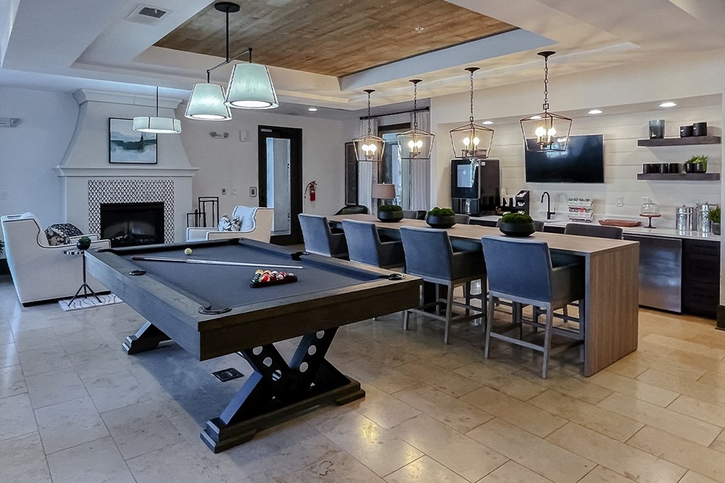 Resident lounge with billiards tables at Two Addison Place Apartments , Pooler, GA