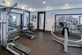 Strength equipment in the fitness center at Two Addison Place, Pooler