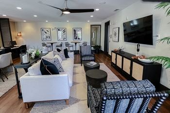 Business center sofa seating   at Two Addison Place Apartments , Georgia