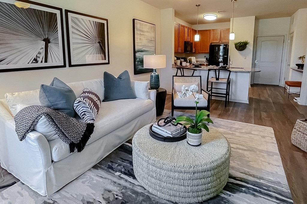 Open living room kitchen and dining area at Two Addison Place Apartments , Pooler