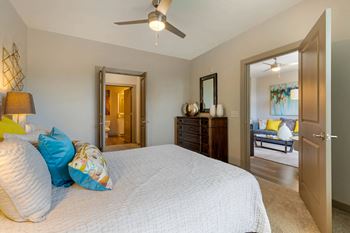 bedroom with ceiling fan and dresser at 1010 Dilworth Apartments, Charlotte