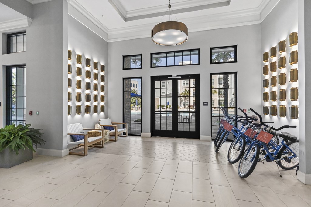 a group of bikes parked in the lobby of a building at Central Island Square, Daniel Island