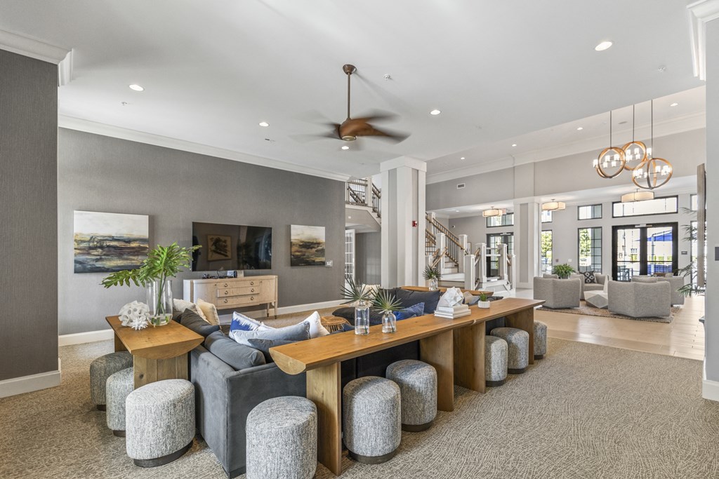 a large living room with a large table and chairs at Central Island Square, Daniel Island, SC