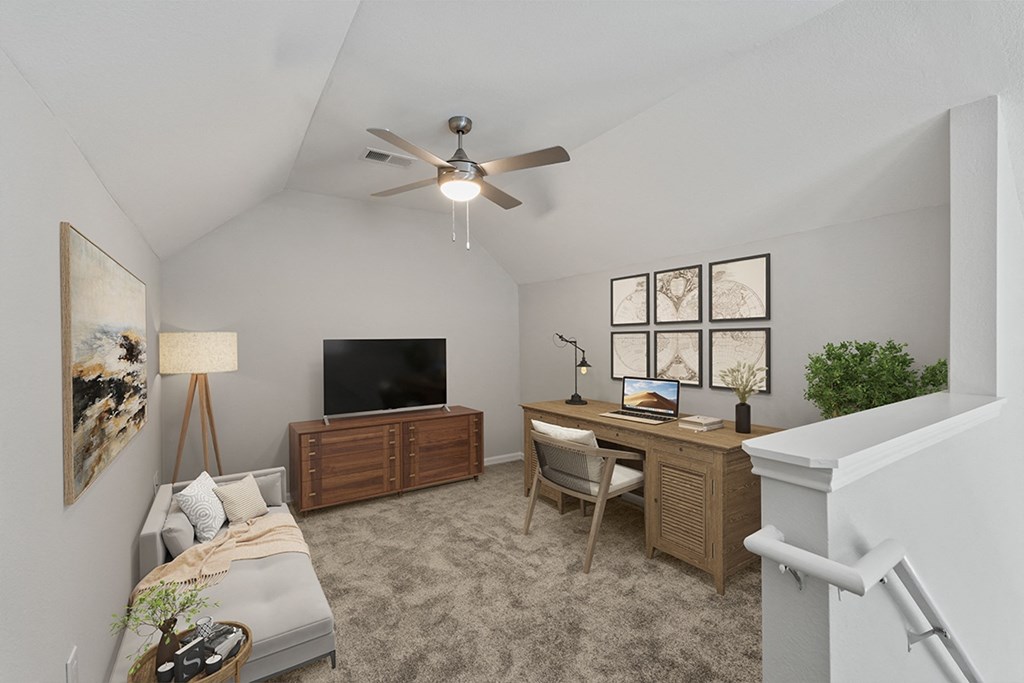 a home office in a loft with a ceiling fan and a flat screen tv at Fortress Grove, Murfreesboro, Tennessee