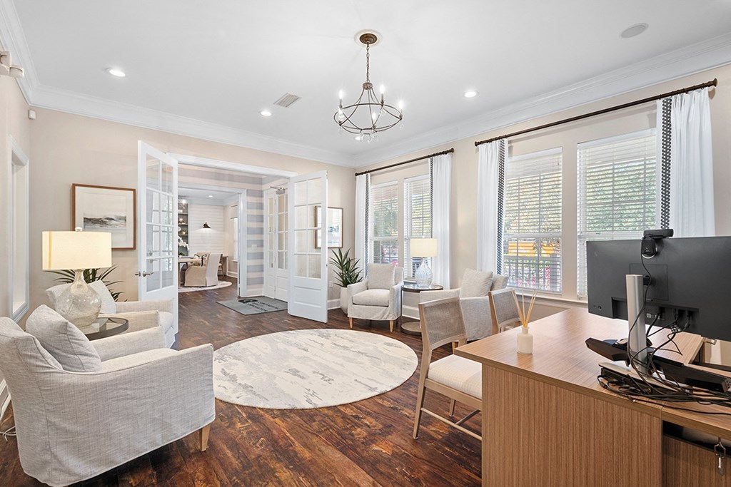 a living room with a couch and a tv at Sweetgrass Landing, South Carolina