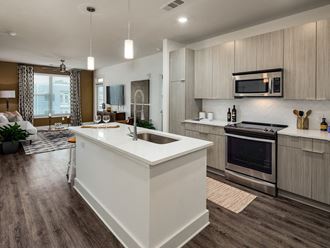 Spacious Full Size Kitchen Spacious Full Size Kitchen at Millworks Apartments, Georgia, 30318 - Photo Gallery