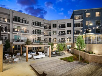 Large Poolside Patio Large Poolside Patio at Millworks Apartments, Atlanta - Photo Gallery 2