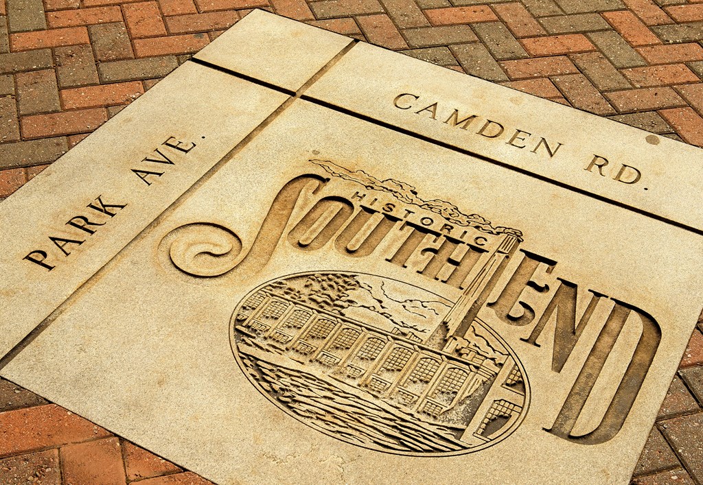 a sign on the ground that says park avenue and camden road at Park & Kingston Charlotte NC 28203