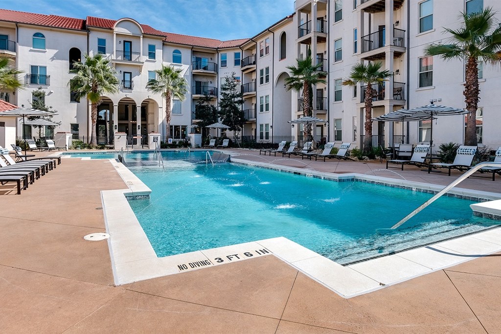 Resort style pool in center of community  at Two Addison Place Apartments , Pooler, Georgia