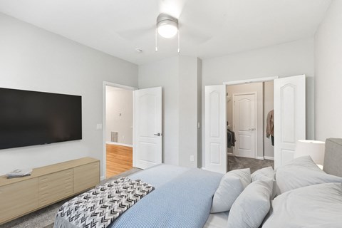 A bedroom with a large bed and a flat screen TV at Sweetgrass Landing, Mount Pleasant, SC, 29466