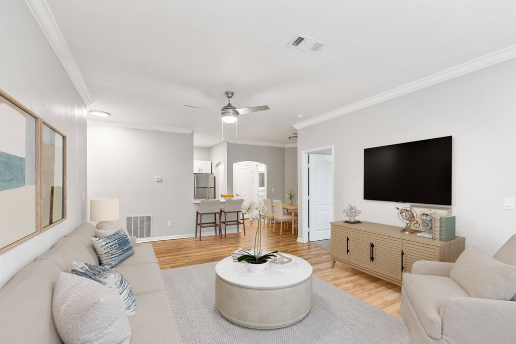 A living room with a grey couch and a round coffee table at Sweetgrass Landing, Mount Pleasant, South Carolina, 29466