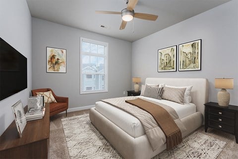 Bedroom with ceiling fan at The Reserve at Mayfaire Apartments, Wilmington NC