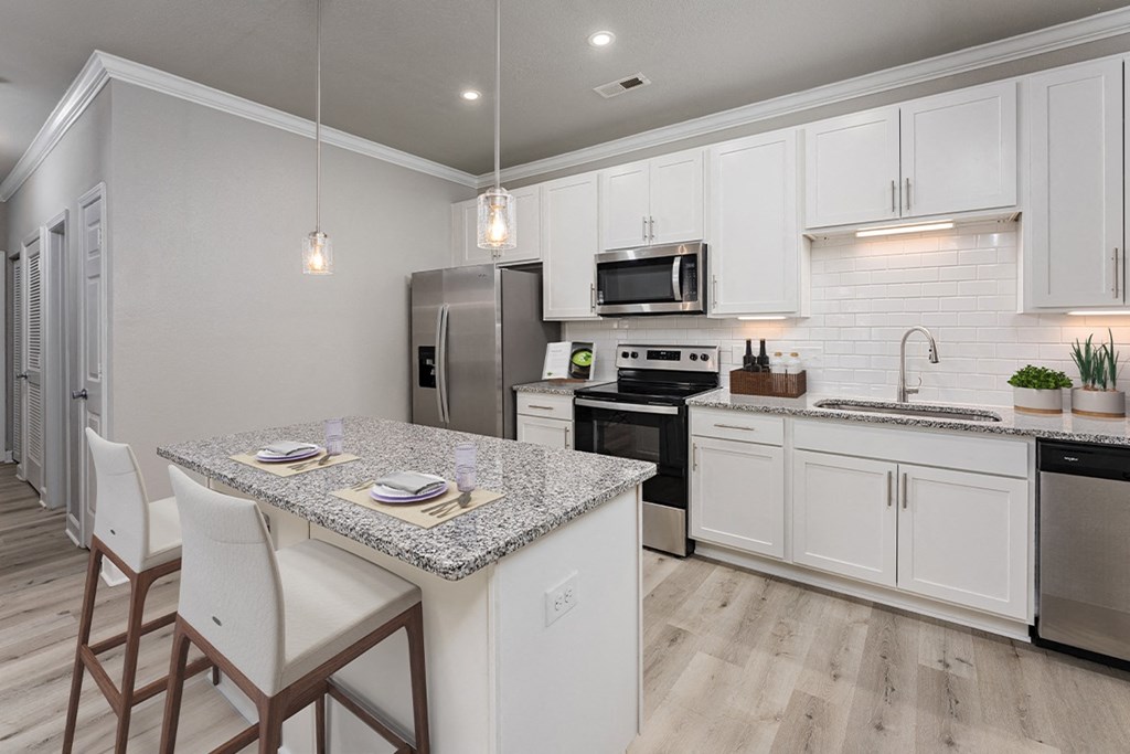 Kitchen with island at The Reserve at Mayfaire Apartments, Wilmington NC