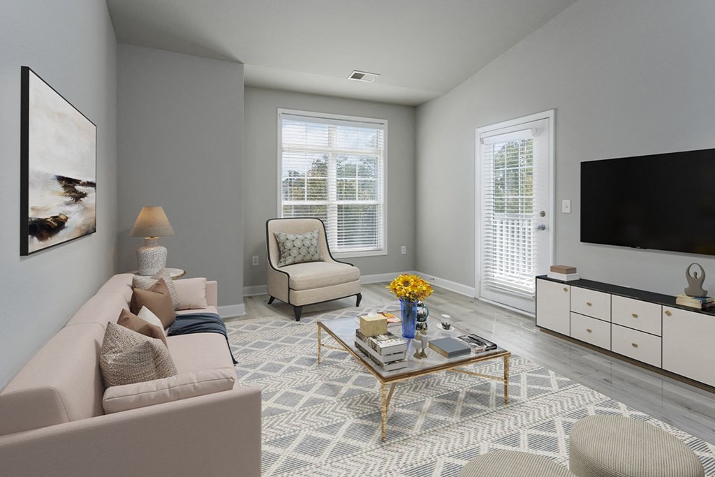 Living room with patio access at The Reserve at Mayfaire Apartments, Wilmington NC