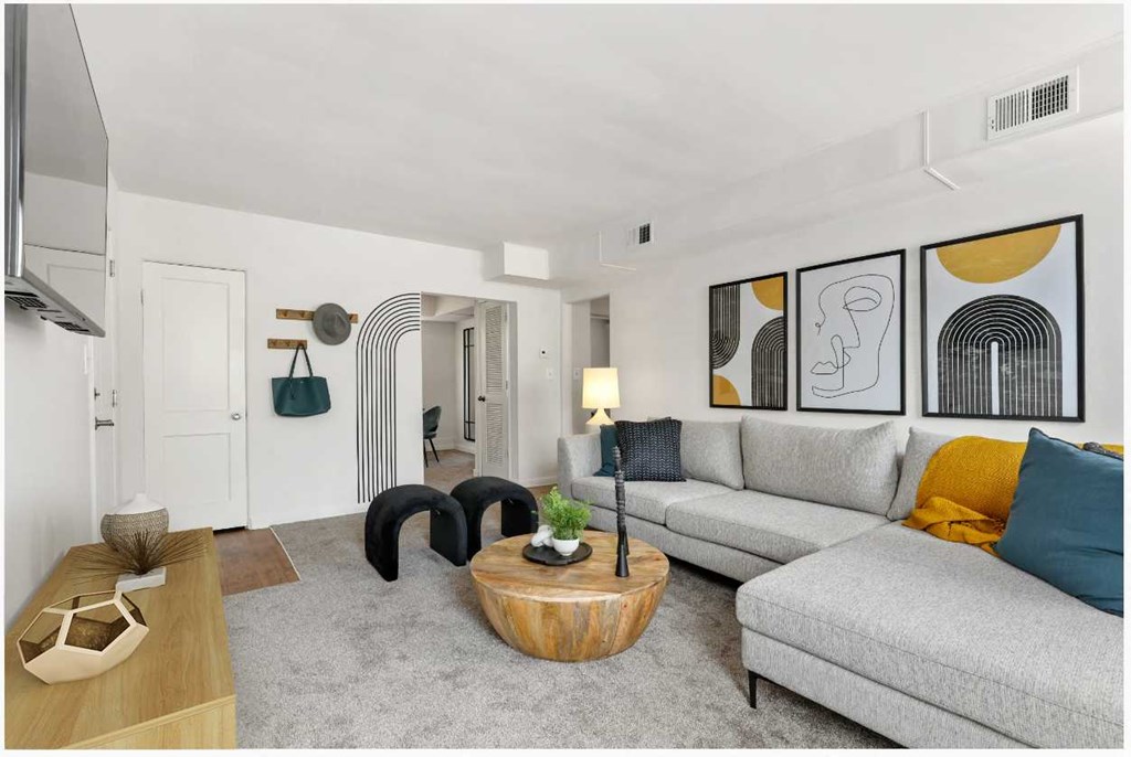 Spacious living room with sectional sofa at Donnybrook Apartments, Maryland, 21286