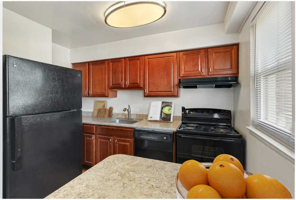 Kitchen with breakfast bar at Donnybrook Apartments, Maryland, 21286
