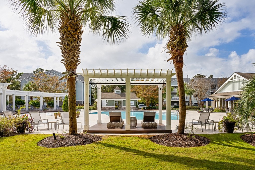 Pool with cabana seating at The Reserve at Mayfaire Apartments, Wilmington NC