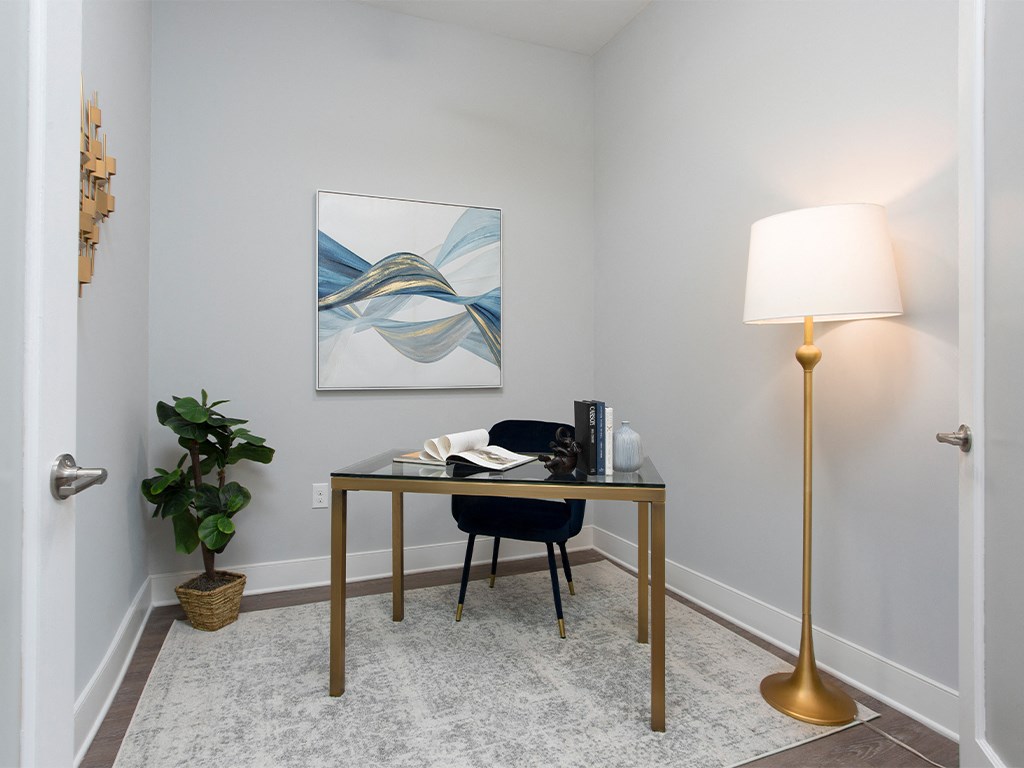 Den with desk and chair at St Mary's Square North Apartments, North Carolina