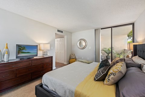 our apartments offer a bedroom with a large bed and a tv