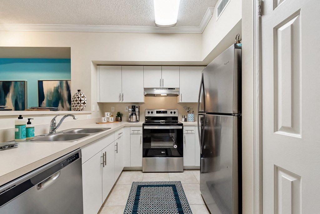 the preserve at ballantyne commons apartment kitchen with stainless steel appliances