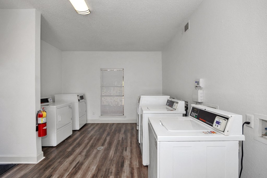 A laundry room with a washer and dryer.