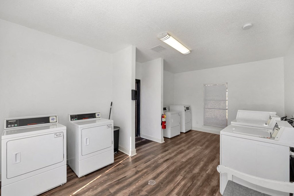 A laundry room with a washer and dryer.