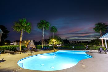 the swimming pool at night at the resort at night