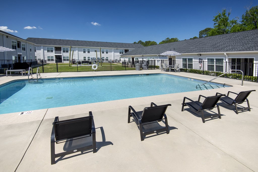 our apartments have a resort style pool with lounge chairs