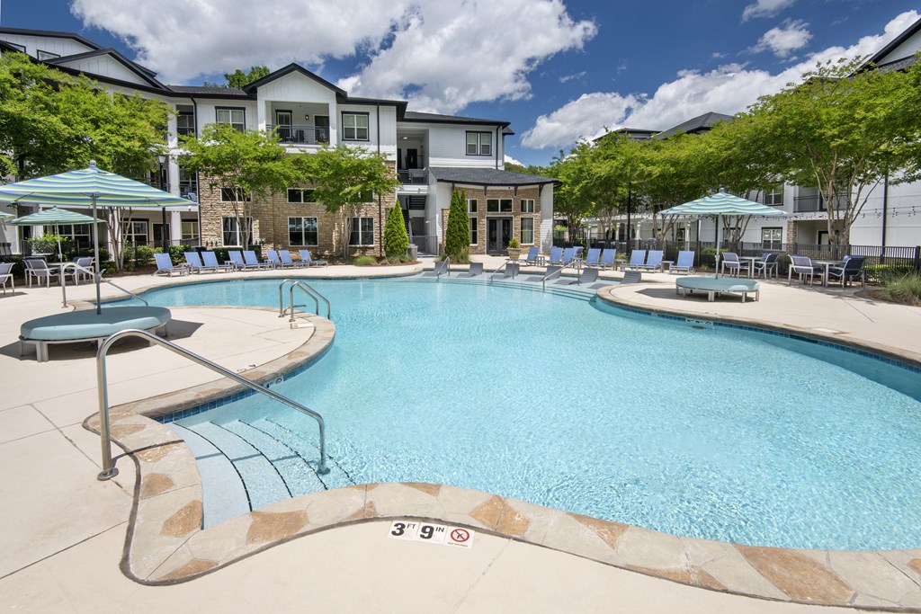 A large swimming pool with a depth of 3 feet 9 inches.