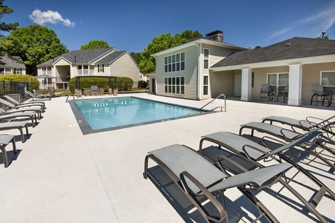 our apartments have a large pool and lounge chairs