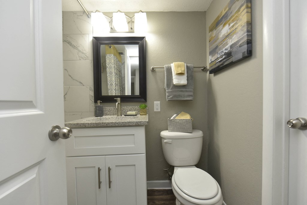 a small bathroom with a toilet and a sink