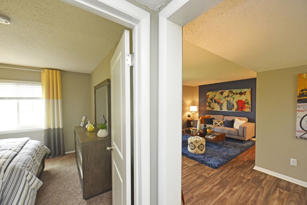 the view of the living room from the bedroom in an apartment
