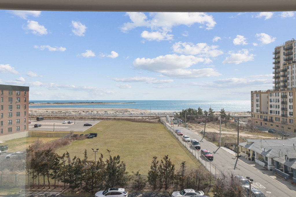 the view of the ocean from the apartment balcony